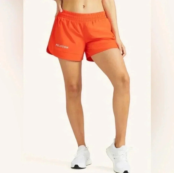 PELOTON orange Velocity shorts NWOT Size XL - Picture 1 of 10
